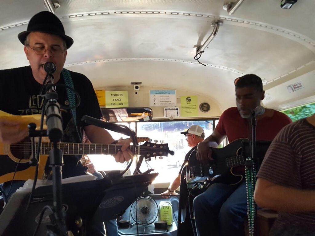 Live band performing for a party in Atlanta, GA on the Rockin Road Trip party bus.